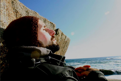 A past sit-a-thon participant, Earl, relaxes and unplugs at his sit spot.