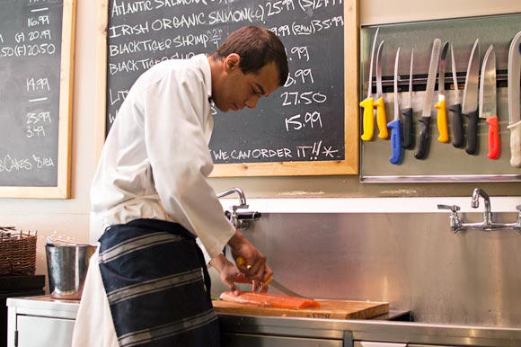 Preparing fresh fish at Just an Olde Fashion Butchery & Seafood