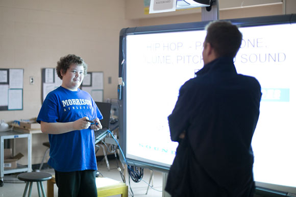 Nils Blondon, working with students in the Literacy Through Hip Hop program.