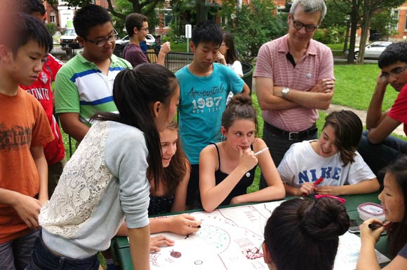 Dave Harvey of Parks People guides Maximum City students through a student redesign of a local park.