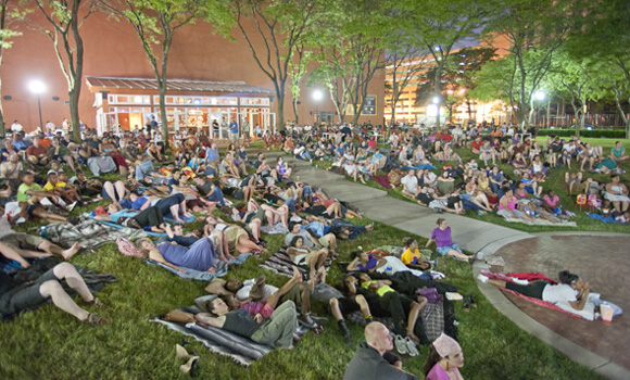 People gather at a placemaking event in Detroit