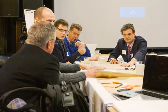 Heads of both the Liberty Village & Queen West BIA discuss ideas at the table.