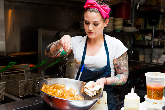 Sonia Mondino prepares fresh house-made chips.