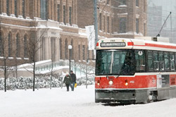 The 506 College slides through the snow outside MaRs.