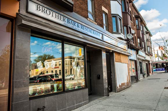 Refreshed signage and facade at Brother's Bar at St. Clair West & Oakwood Ave.