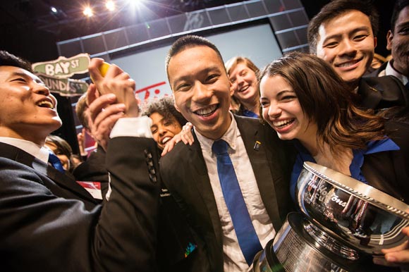 Curtis Yim, President of Enactus Ryerson, celebrating his team's victory at the 2013 National Exposition.